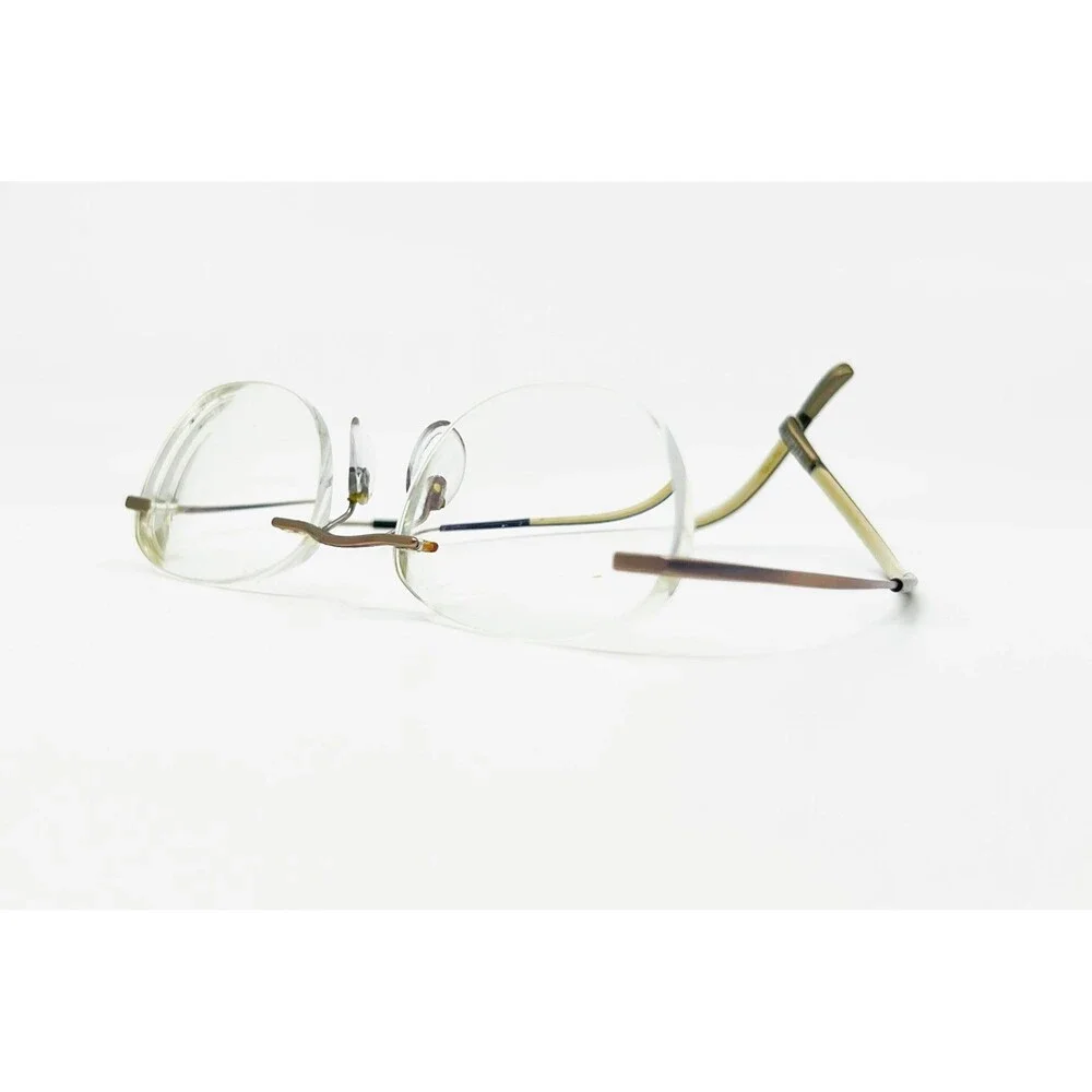 Silhouette Eyeglasses Unisex Brown Rimless Oval Frame 45373 OS